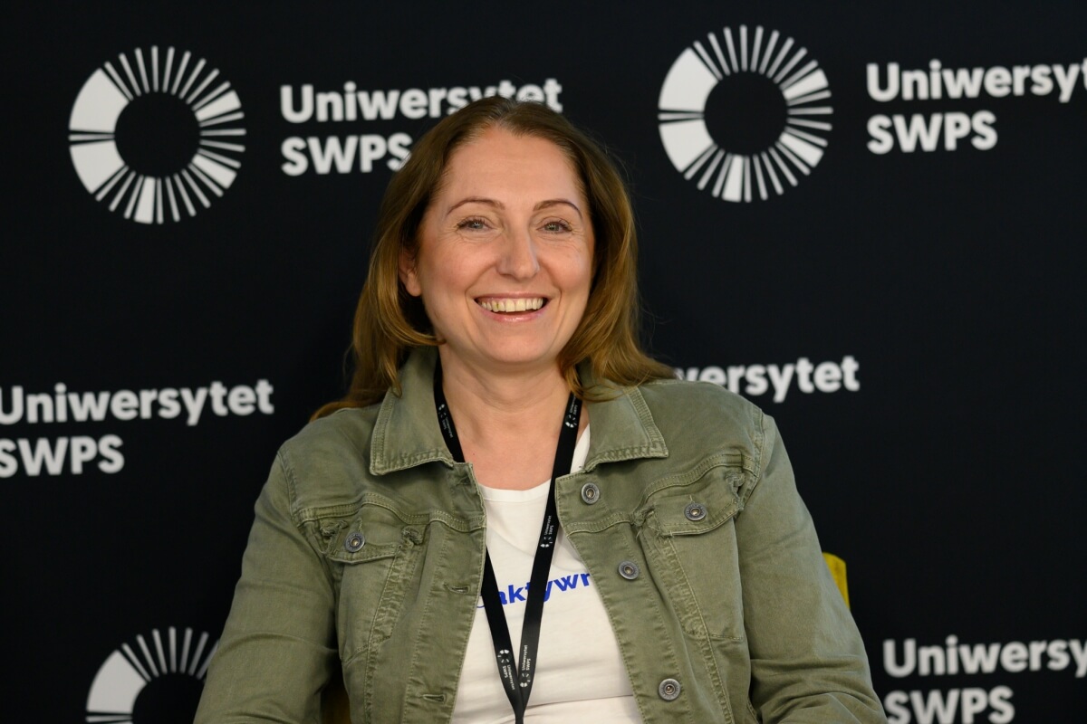 Katarzyna Klimek, uczestniczka debaty dotyczącej jakości życia, która odbywa się na Uniwersytecie SWPS
